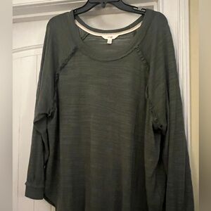 Green tunic with ruffle detail